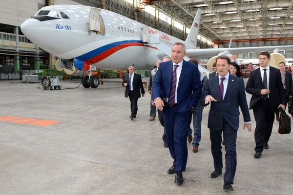 Russian Deputy Prime Minister Dmitry Rogozin, left, and Governor of the Voronezh Region Alexei Gordeyev visit the VASO Voronezh Aircraft Plant - Sputnik International