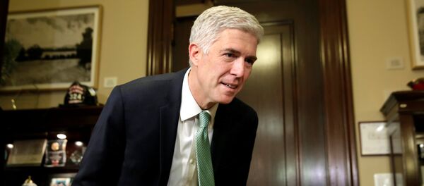 U.S. Supreme Court nominee Judge Neil Gorsuch takes a seat before his meeting with Senator Senator Mark Warner (D-VA) on Capitol Hill in Washington, U.S., February 14, 2017 U.S. Supreme Court nominee Judge Neil Gorsuch takes a seat before his meeting with Senator Senator Mark Warner (D-VA) on Capitol Hill in Washington, U.S., February 14, 2017 - Sputnik International