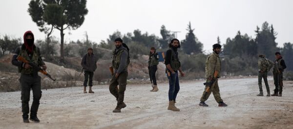 Free Syrian Army fighters carry their weapons as they stand on the outskirts of the northern Syrian town of al-Bab, Syria February 4, 2017. Free Syrian Army fighters carry their weapons as they stand on the outskirts of the northern Syrian town of al-Bab, Syria February 4, 2017. - Sputnik International