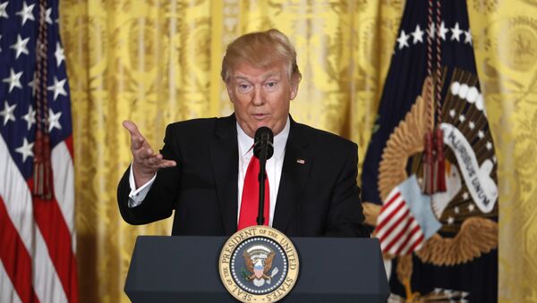 President Donald Trump speaks during a news conference in the East Room of the White House in Washington - Sputnik International