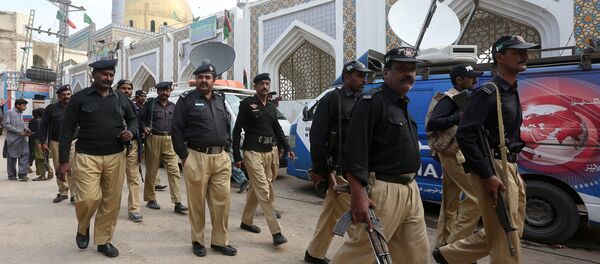 Policemen gather outside the tomb of Sufi saint Syed Usman Marwandi, also known as the Lal Shahbaz Qalandar shrine, after Thursday's suicide blast in Sehwan Sharif, Pakistan's southern Sindh province, February 17, 2017. Policemen gather outside the tomb of Sufi saint Syed Usman Marwandi, also known as the Lal Shahbaz Qalandar shrine, after Thursday's suicide blast in Sehwan Sharif, Pakistan's southern Sindh province, February 17, 2017. - Sputnik International