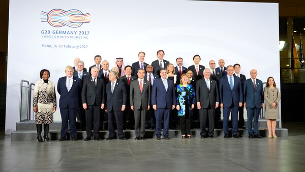 Participants of the G-20 foreign ministers' meeting pose for a group photo at the World Conference Center on February 16, 2017 in Bonn, Germany. - Sputnik International