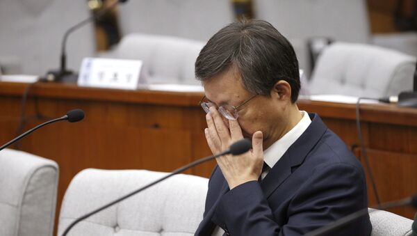 Former presidential secretary Woo Byung-woo attends a hearing at the National Assembly in Seoul, South Korea, Thursday, Dec. 22, 2016. - Sputnik International