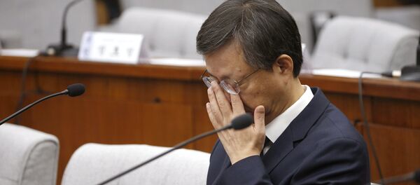 Former presidential secretary Woo Byung-woo attends a hearing at the National Assembly in Seoul, South Korea, Thursday, Dec. 22, 2016. Former presidential secretary Woo Byung-woo attends a hearing at the National Assembly in Seoul, South Korea, Thursday, Dec. 22, 2016. - Sputnik International