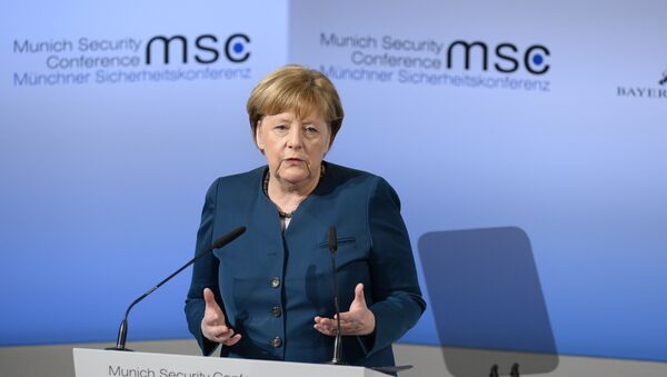 German Chancellor Angela Merkel delivers a speech on the 2nd day of the 53rd Munich Security Conference (MCS) in Munich, southern Germany, on February 18, 2017 - Sputnik International