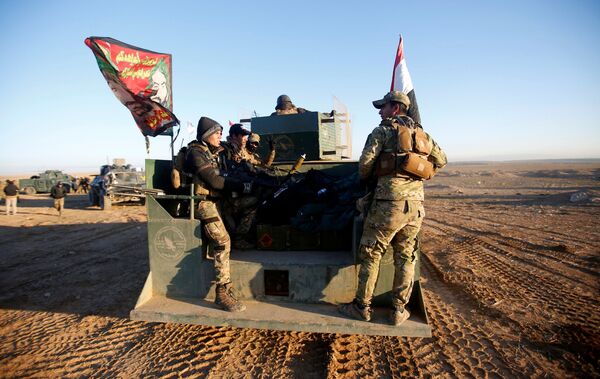 Iraqi security forces advance towards the western side of Mosul, Iraq February 19, 2017 Iraqi security forces advance towards the western side of Mosul, Iraq February 19, 2017 - Sputnik International