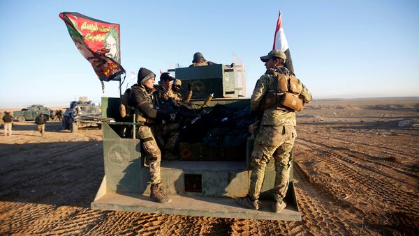 Iraqi security forces advance towards the western side of Mosul, Iraq February 19, 2017. - Sputnik International
