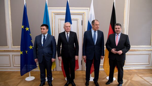 Foreign ministers of the so-called Normandy format (L to R) Ukraine's Foreign Minister Pavlo Klimkin, French Foreign Minister Jean-Marc Ayrault, Russian Foreign Minister Sergei Lavrov and German Foreign Minister Sigmar Gabriel pose for a photographer ahead talks at the 53rd Munich Security Conference (MSC) at the Bayerischer Hof hotel in Munich, southern Germany, on February 18, 2017 - Sputnik International