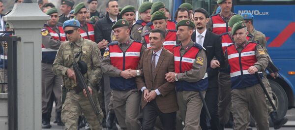 Zekeriya Kuzu, one of the main suspects accused of attempting to assassinate Turkish President Tayyip Erdogan on the night of the failed last year's July 15 coup, and the other soldiers are escorted by Turkish gendarmes as they arrive for the first hearing of the trial in Mugla, Turkey, February 20, 2017 Zekeriya Kuzu, one of the main suspects accused of attempting to assassinate Turkish President Tayyip Erdogan on the night of the failed last year's July 15 coup, and the other soldiers are escorted by Turkish gendarmes as they arrive for the first hearing of the trial in Mugla, Turkey, February 20, 2017 - Sputnik International