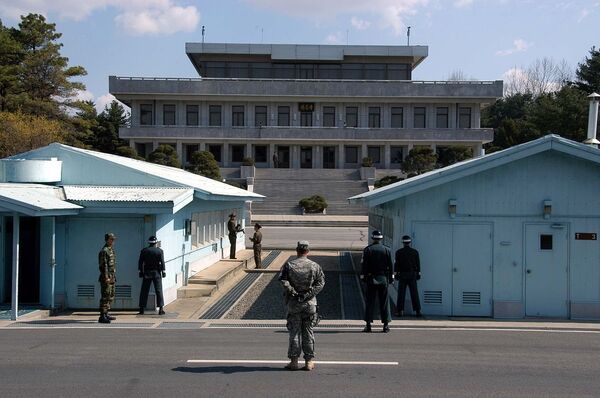 A view from South Korea towards North Korea in the Joint Security Area at Panmunjom. North and South Korean military personnel, as well as a single US soldier, are shown A view from South Korea towards North Korea in the Joint Security Area at Panmunjom. North and South Korean military personnel, as well as a single US soldier, are shown - Sputnik International
