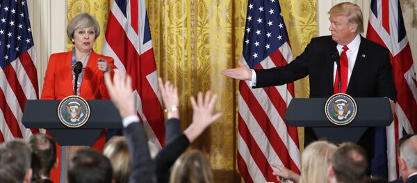 President Donald Trump and British Prime Minister Theresa May during their joint news conference in the East Room of the White House White House in Washington, Friday, Jan. 27, 2017. - Sputnik International