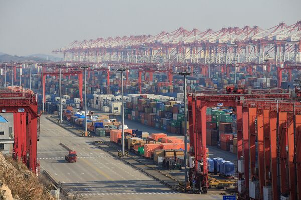 Containers are seen at the Yangshan Deep Water Port, part of the Shanghai Free Trade Zone, in Shanghai, China, February 13, 2017 Containers are seen at the Yangshan Deep Water Port, part of the Shanghai Free Trade Zone, in Shanghai, China, February 13, 2017 - Sputnik International