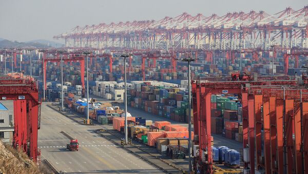 Containers are seen at the Yangshan Deep Water Port, part of the Shanghai Free Trade Zone, in Shanghai, China, February 13, 2017 - Sputnik International