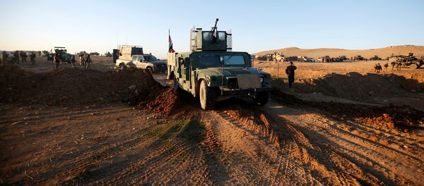 Iraqi security forces advance towards the western side of Mosul, Iraq February 19, 2017 Iraqi security forces advance towards the western side of Mosul, Iraq February 19, 2017 - Sputnik International