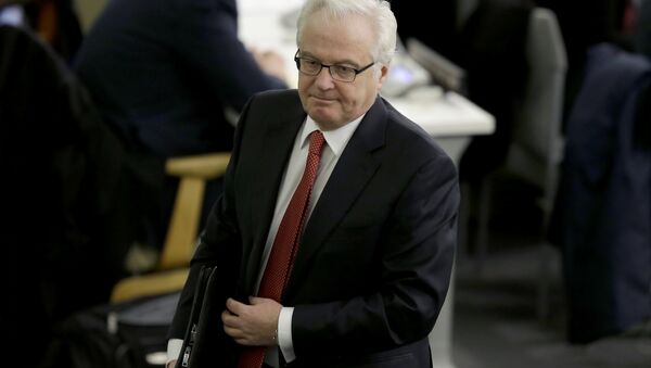 Russian ambassador to the United Nations Vitaly Churkin leaves the General assembly hall after a vote supporting the territorial integrity of Ukraine at United Nations headquarters, Thursday, March 27, 2014 - Sputnik International