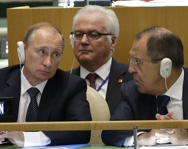 Russia's President Vladimir Putin, left, Foreign Minister Sergey Lavrov, right, and Ambassador to the United Nations Vitaly Churkin listen to speakers during the 70th session of the United Nations General Assembly at U.N. headquarters, Monday, Sept. 28, 2015 Russia's President Vladimir Putin, left, Foreign Minister Sergey Lavrov, right, and Ambassador to the United Nations Vitaly Churkin listen to speakers during the 70th session of the United Nations General Assembly at U.N. headquarters, Monday, Sept. 28, 2015 - Sputnik International