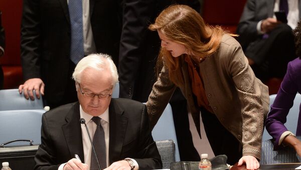 US Ambassador to the UN Samantha Power talks with her Russian counterpart Vitaly Churkin prior to a vote on a resolution on Ukraine during a UN Security Council emergency meeting at United Nations headquarters in New York on March 15, 2014 - Sputnik International