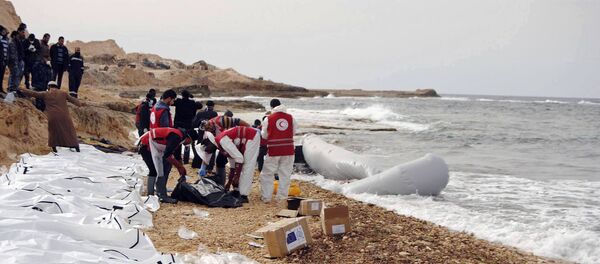 This Monday, Feb. 20, 2017 photo provided by The International Federation of Red Cross and Red Crescent Societies (IFRC), shows the bodies of people that washed ashore and were recovered by the Libyan Red Crescent, near Zawiya, Libya This Monday, Feb. 20, 2017 photo provided by The International Federation of Red Cross and Red Crescent Societies (IFRC), shows the bodies of people that washed ashore and were recovered by the Libyan Red Crescent, near Zawiya, Libya - Sputnik International