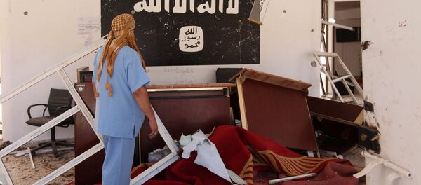 A Libyan man checks a building used by the Islamic State fighters after it was captured by Libyan forces allied with the U.N.-backed government, in Sirte, Libya August 22, 2016. A Libyan man checks a building used by the Islamic State fighters after it was captured by Libyan forces allied with the U.N.-backed government, in Sirte, Libya August 22, 2016. - Sputnik International