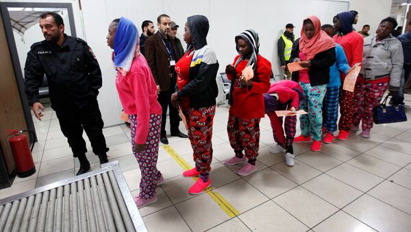 African migrants wait to be deported at Mitiga International Airport, east of Tripoli, Libya, February 14, 2017. - Sputnik International