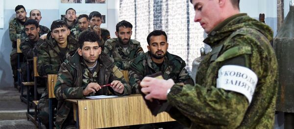 Russian and Syrian servicemen at the Russian Armed Forces’ International Mine Action Center in Aleppo Russian and Syrian servicemen at the Russian Armed Forces’ International Mine Action Center in Aleppo - Sputnik International