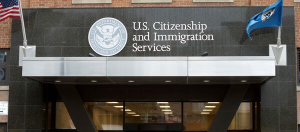 People stand on the steps of the U.S. Citizenship and Immigration Services offices in New York, U.S. (File) - Sputnik International