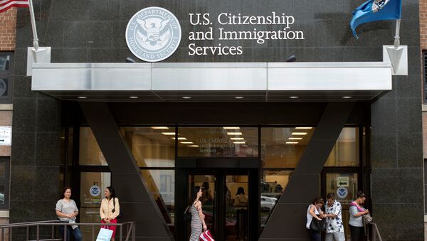 People stand on the steps of the U.S. Citizenship and Immigration Services offices in New York, U.S. (File) - Sputnik International