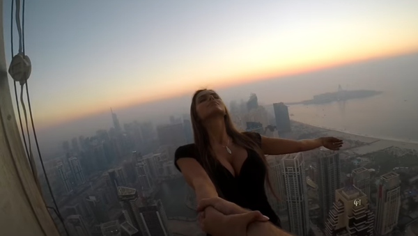 Russian Instagram Model Viktoria “Viki” Odintcova Atop the Cayan Tower - Sputnik International