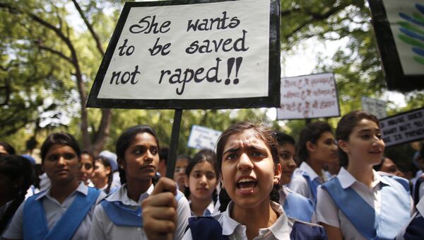 Indian students shout slogans as they hold placards demanding stringent punishment to rapists during a protest in New Delhi, India (File) - Sputnik International