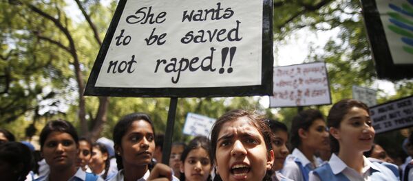 Indian students shout slogans as they hold placards demanding stringent punishment to rapists during a protest in New Delhi, India (File) - Sputnik International