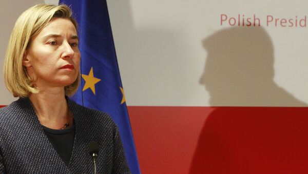 The High Representative of the European Union for Foreign Affairs and Security Policy Federica Mogherini attends a press conference, as the shadow of Poland's Foreign Minister Witold Waszczykowski is seen in the background, after a meeting with foreign ministers of Central and South-Eastern European countries, in Warsaw, Poland, Tuesday, Nov. 29, 2016. - Sputnik International