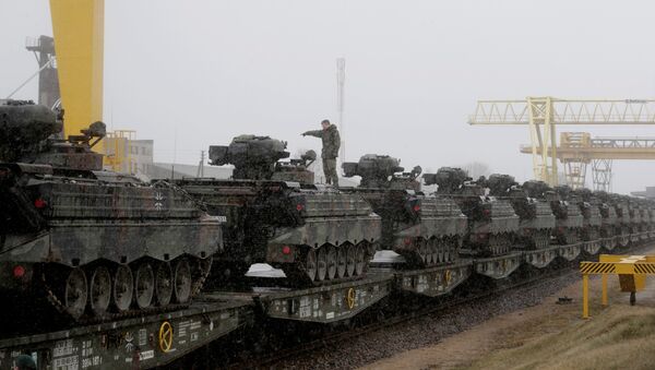 A German army soldier prepares to unload Marder infantry fighting vehicles at the railway station in Sestokai, Lithuania, February 24, 2017 - Sputnik International