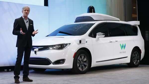 In this Sunday, Jan. 8, 2017, file photo, John Krafcik, CEO of Waymo, the autonomous vehicle company created by Google's parent company, Alphabet, introduces a Chrysler Pacifica hybrid outfitted with Waymo's own suite of sensors and radar, at the North American International Auto Show in Detroit. - Sputnik International