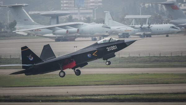 In this photo provided by China's Xinhua News Agency, a J-31 stealth fighter takes off for test flight ahead of the 10th China International Aviation and Aerospace Exhibition in Zhuhai, south China's Guangdong Province, Monday, Nov. 10, 2014. - Sputnik International
