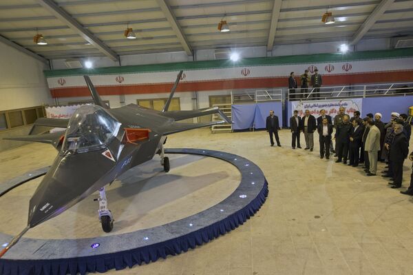 Iran's newest fighter jet, Qaher-313, or Dominant-313, is unveiled by Iranian President Mahmoud Ahmadinejad, accompanied by top officials during a ceremony, in Tehran, Iran, Saturday, Feb. 2, 2013. Iran's newest fighter jet, Qaher-313, or Dominant-313, is unveiled by Iranian President Mahmoud Ahmadinejad, accompanied by top officials during a ceremony, in Tehran, Iran, Saturday, Feb. 2, 2013. - Sputnik International