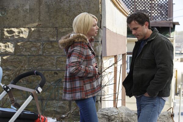 This image released by Roadside Attractions and Amazon Studios shows Michelle Williams, left, and Casey Affleck in a scene from Manchester By The Sea. This image released by Roadside Attractions and Amazon Studios shows Michelle Williams, left, and Casey Affleck in a scene from Manchester By The Sea. - Sputnik International