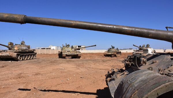 Syrian army tanks are positioned on the eastern outskirts of the northern Syrian city of Aleppo on February 17, 2017 - Sputnik International