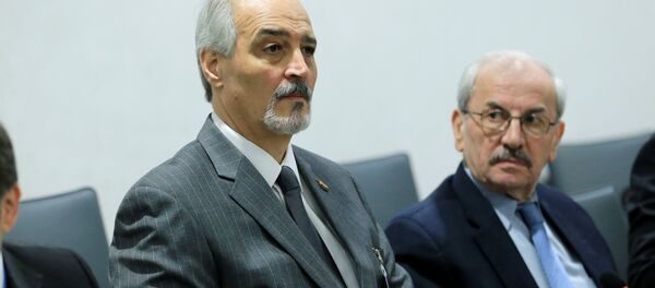 Syrian Ambassador to the U.N. Bashar al Jaafari (L) attends a meeting of Intra-Syria peace talks with UN Special Envoy for Syria Staffan de Mistura at Palais des Nations in Geneva, Switzerland, February 25, 2017 - Sputnik International