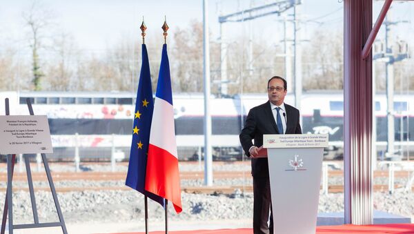 French President Francois Hollande delivers a speech as he attends the inauguration of the new high-speed rail line, linking Tours and Bordeaux, in Villognon, central France. - Sputnik International