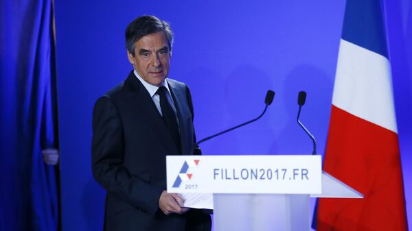 Conservative presidential candidate Francois Fillon arrives to deliver his speech at his campaign headquarters in Paris, Wednesday, March 1, 2017 - Sputnik International