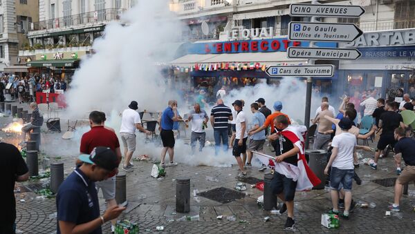 French police use tear gas against England supporters in downtown Marseille, France, Friday, June 10, 2016 - Sputnik International