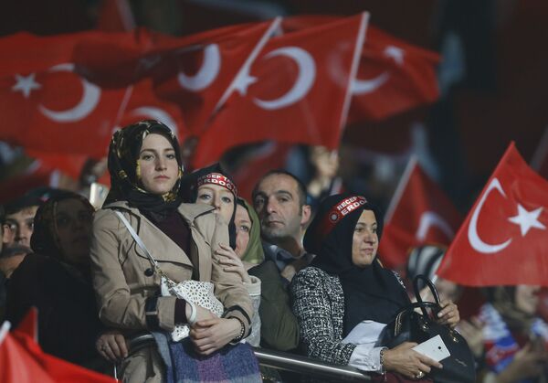 Supporters of the ruling AK Party wave Turkish flags during a campaign meeting for the April 16 constitutional referendum, in Ankara, Turkey, February 25, 2017. Supporters of the ruling AK Party wave Turkish flags during a campaign meeting for the April 16 constitutional referendum, in Ankara, Turkey, February 25, 2017. - Sputnik International