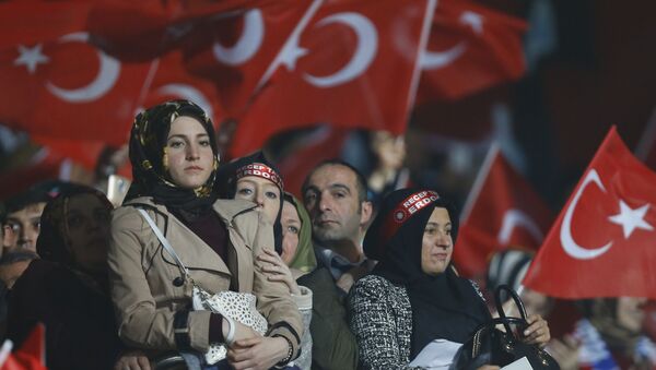 Supporters of the ruling AK Party wave Turkish flags during a campaign meeting for the April 16 constitutional referendum, in Ankara, Turkey, February 25, 2017. - Sputnik International
