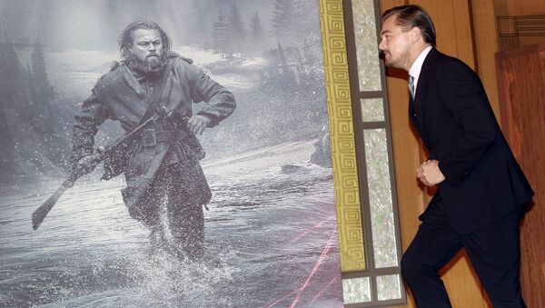 Actor Leonardo DiCaprio walks in the stage during a news conference of the movie “The Revenant” in Tokyo, Wednesday, March 23, 2016 - Sputnik International