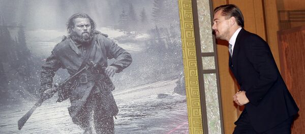 Actor Leonardo DiCaprio walks in the stage during a news conference of the movie “The Revenant” in Tokyo, Wednesday, March 23, 2016 Actor Leonardo DiCaprio walks in the stage during a news conference of the movie “The Revenant” in Tokyo, Wednesday, March 23, 2016 - Sputnik International