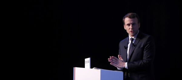 Emmanuel Macron, head of the political movement En Marche !, or Onwards !, and candidate for the 2017 French presidential election, speaks during a news conference to unveil his fully budgeted manifesto, named a contract with the nation, in Paris, France, March 2, 2017 - Sputnik International