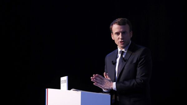 Emmanuel Macron, head of the political movement En Marche !, or Onwards !, and candidate for the 2017 French presidential election, speaks during a news conference to unveil his fully budgeted manifesto, named a contract with the nation, in Paris, France, March 2, 2017 - Sputnik International