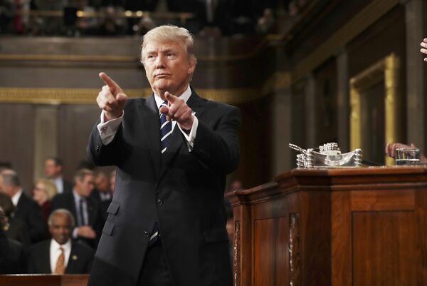 U.S. President Donald Trump reacts after delivering his first address to a joint session of Congress from the floor of the House of Representatives iin Washington, U.S., February 28, 2017 - Sputnik International