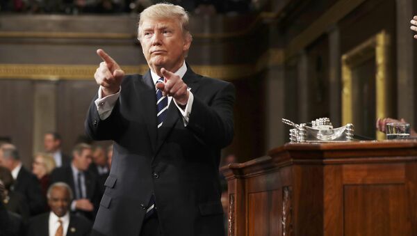 U.S. President Donald Trump reacts after delivering his first address to a joint session of Congress from the floor of the House of Representatives iin Washington, U.S., February 28, 2017 - Sputnik International