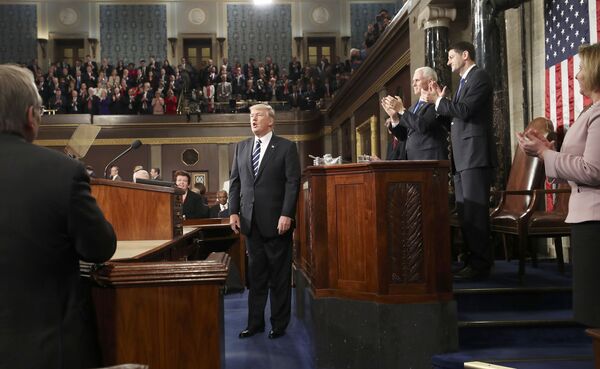 U.S. President Donald Trump is applauded after delivering his first address to a joint session of Congress from the floor of the House of Representatives iin Washington, U.S., February 28, 2017 - Sputnik International